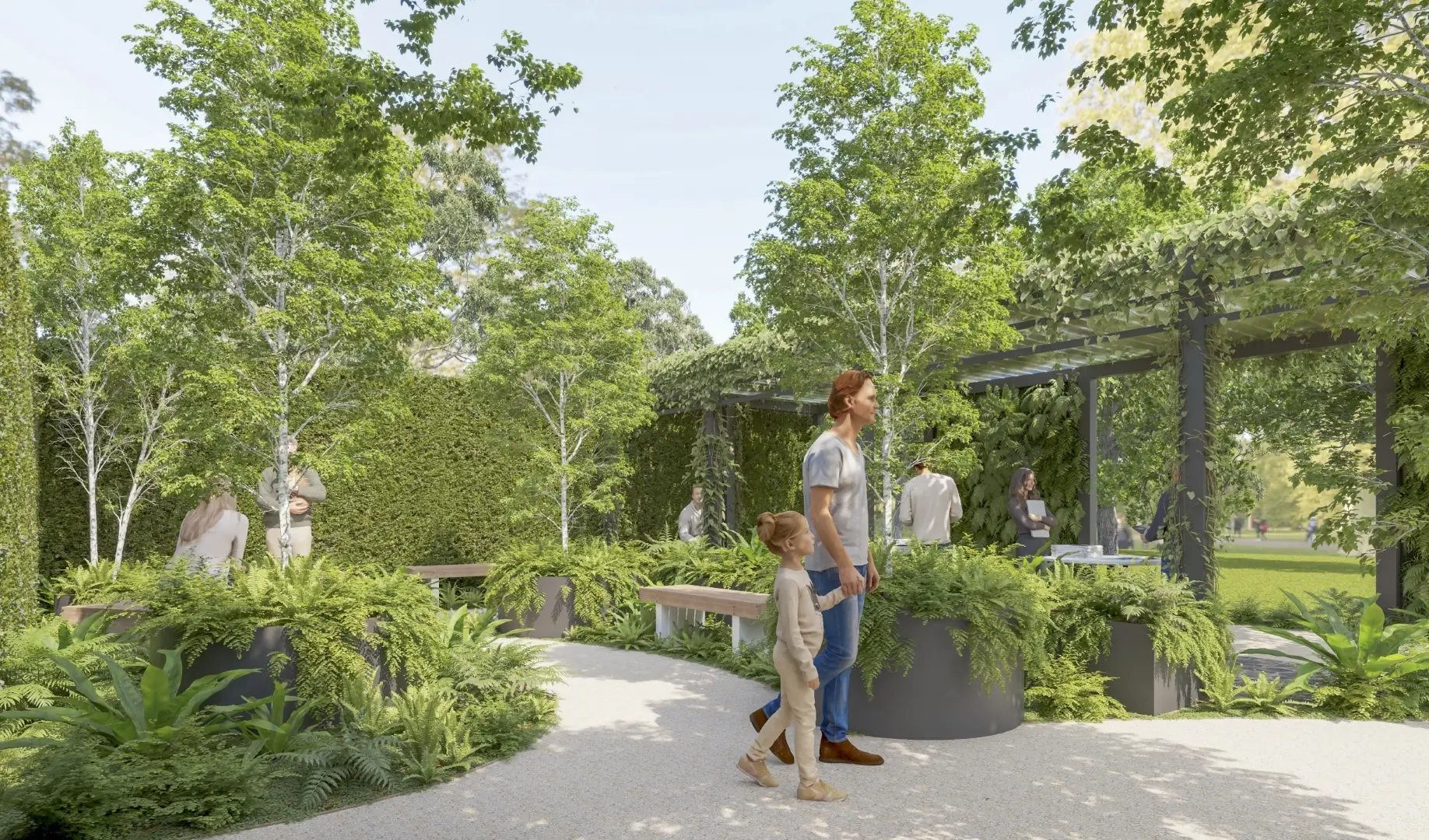 People walking on a curved path through a lush green garden with ferns