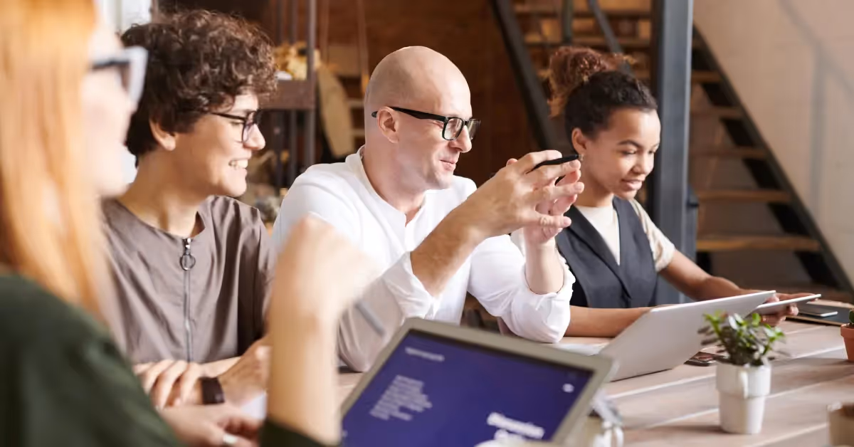 a group of nonprofit employees in a meeting 