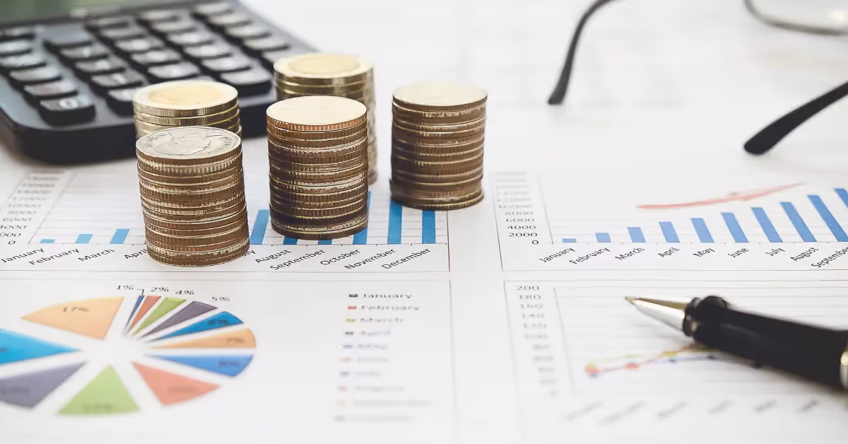coins, data sheets, and other tools used to help accountants.