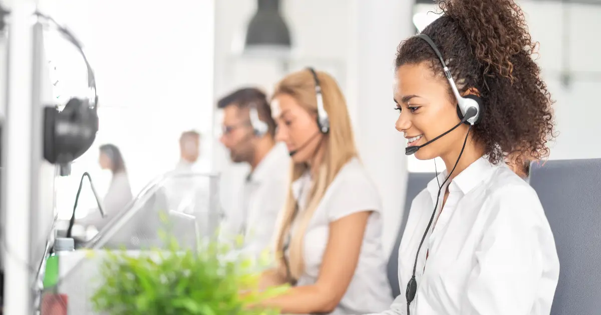 Woman answers support requests in a call center