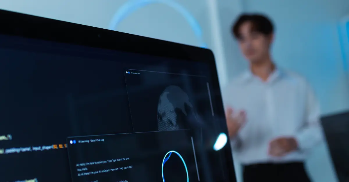 Close u of computer monitor showing A chatbot interface with asked and answer dialog