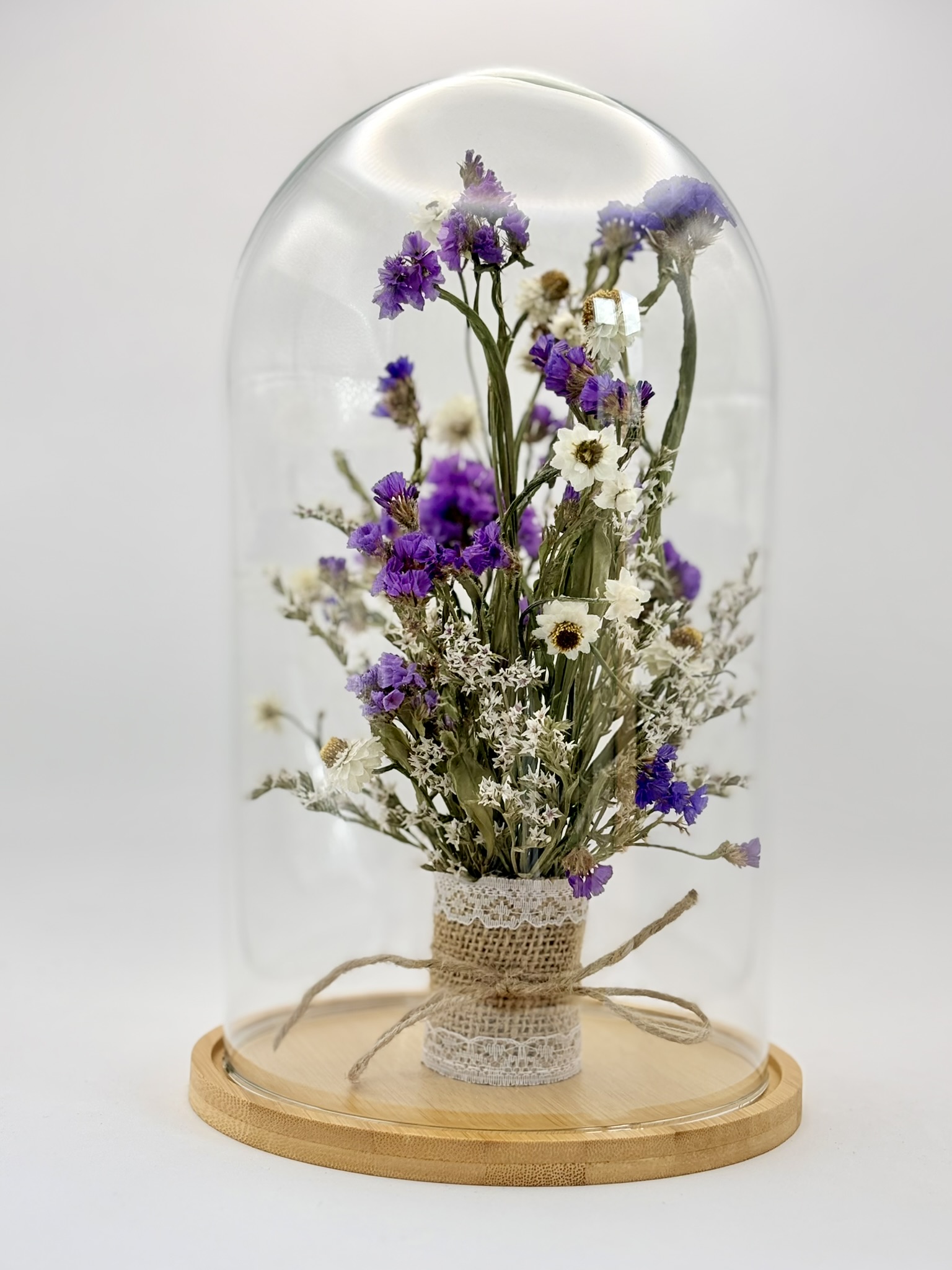 Szklany klosz juta kokardka, limonium fiolet, złociszek