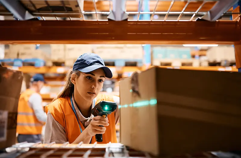 warehouse worker using barcode scanner