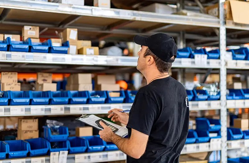 warehouse worker using barcode scanner