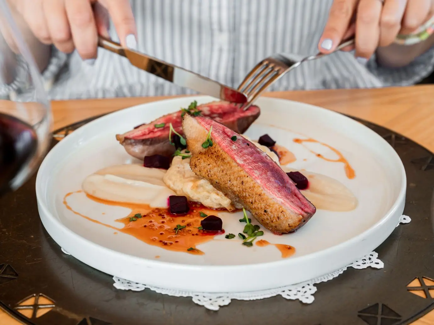 Gourmet duck dish served at a Bled Castle wedding dinner in the castle restaurant