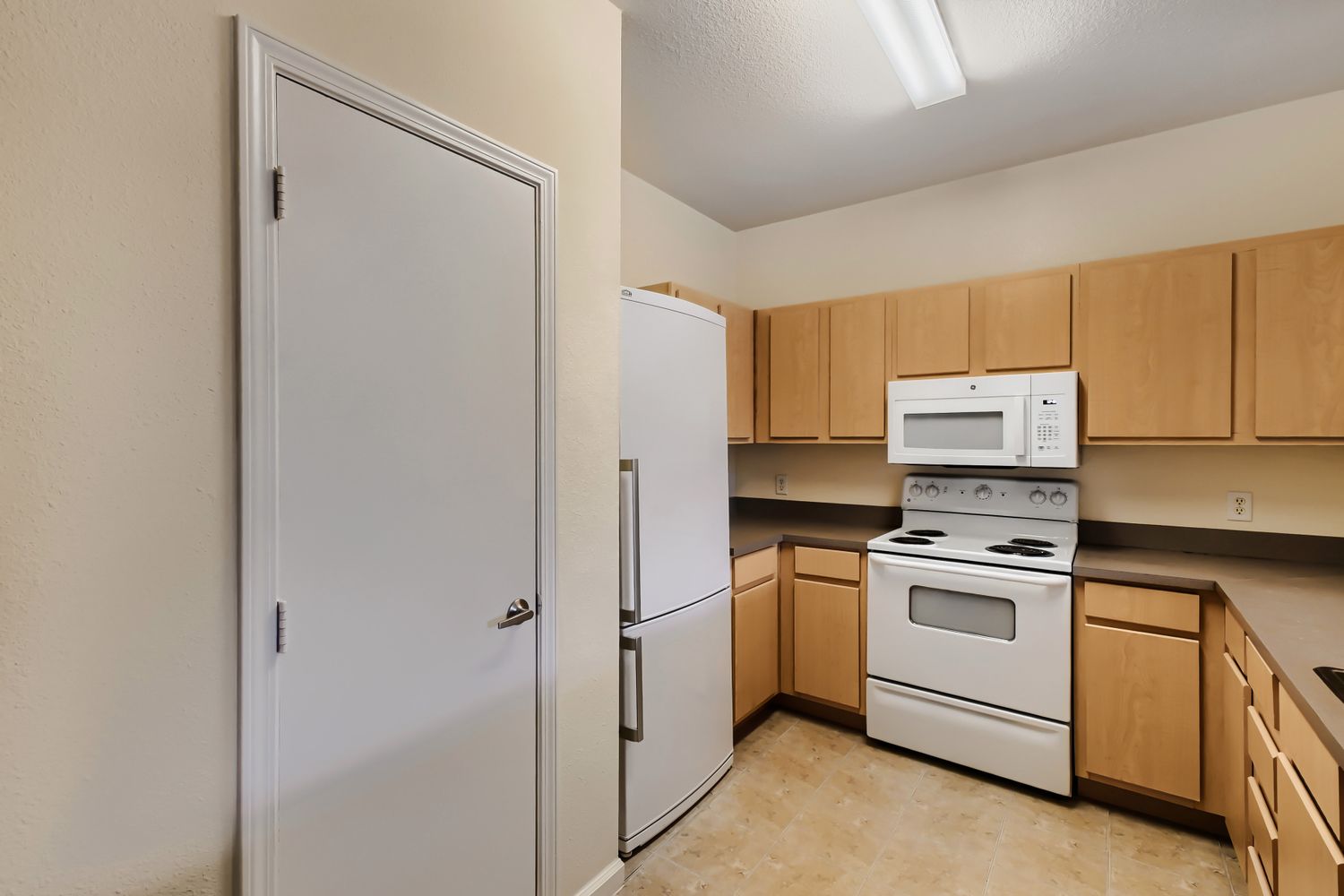 Kitchen with brown cabinets