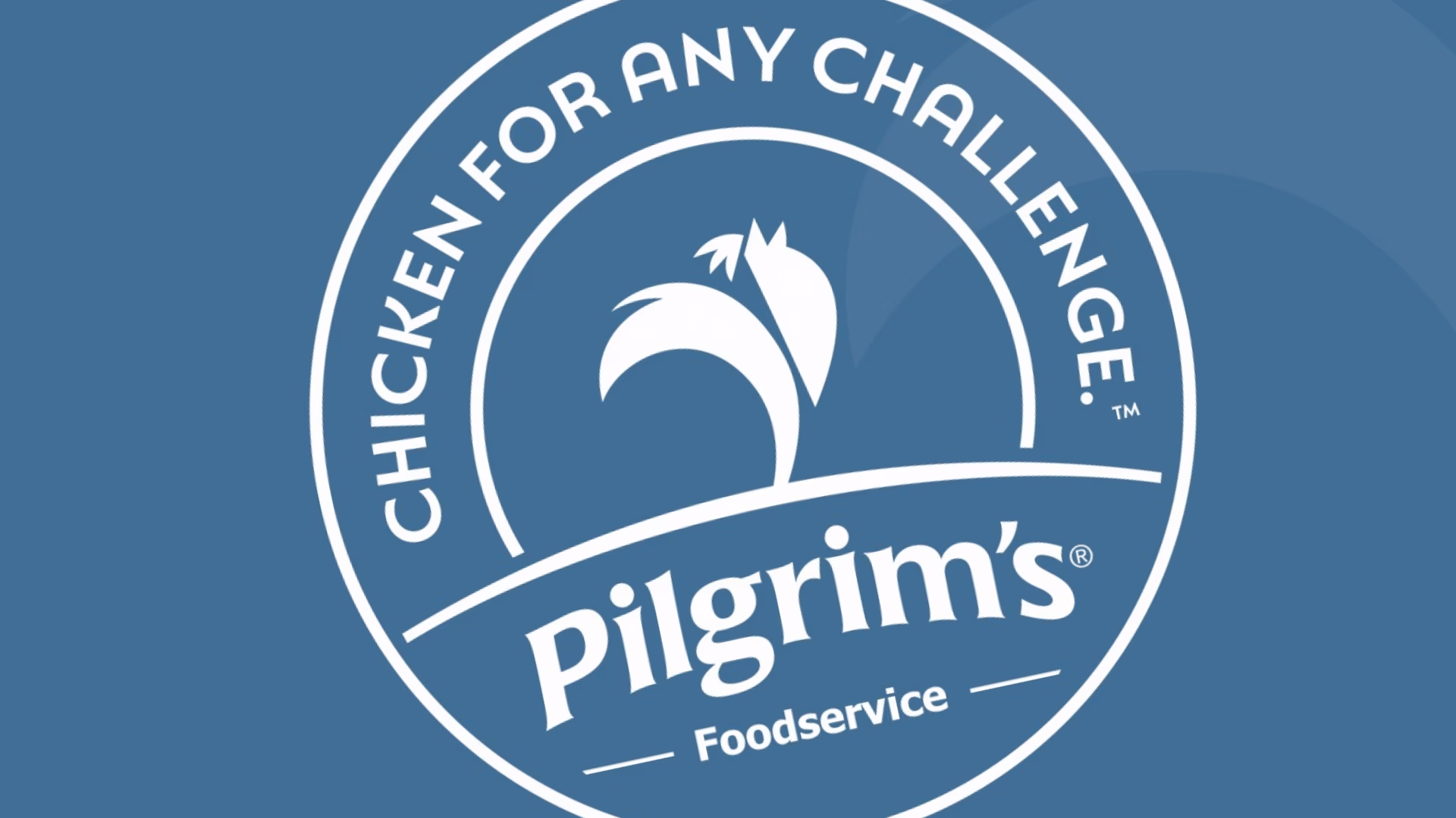 A blue and white circular logo with a rooster silhouette and the words CHICKEN FOR ANY CHALLENGE around the edge. Inside, it says Pilgrims Foodservice.