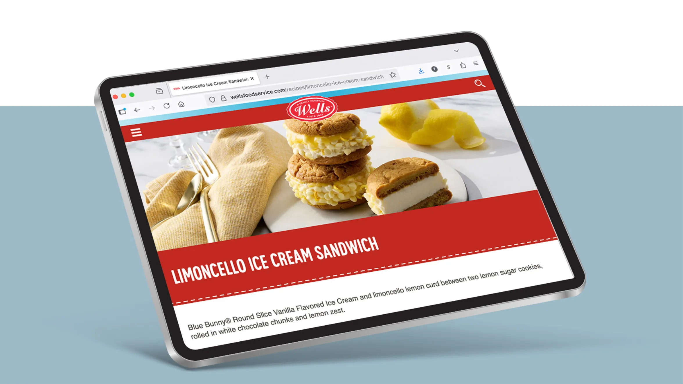 A tablet displays a webpage featuring “Limoncello Ice Cream Sandwich,” showing three ice cream sandwiches on a white plate with a lemon and a cloth napkin in the background.