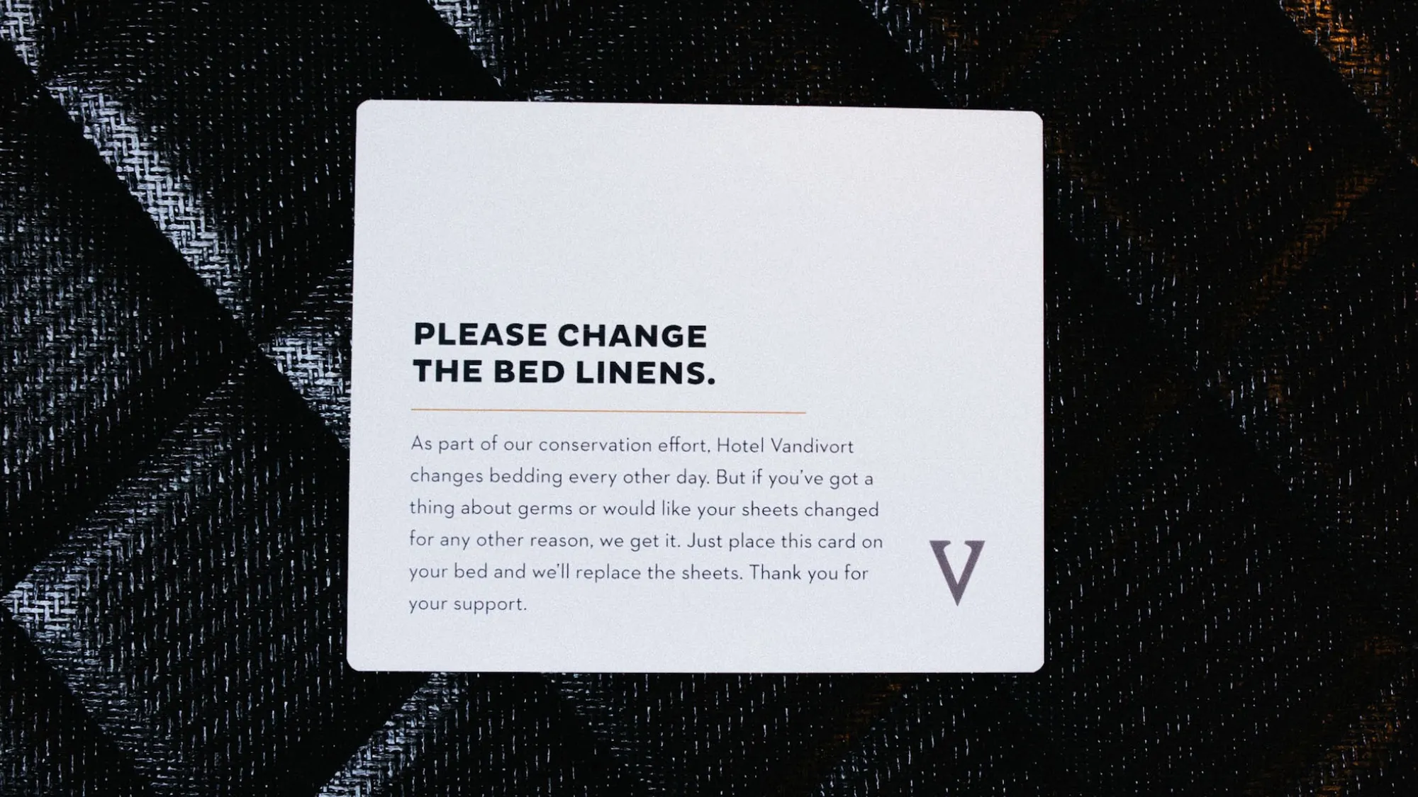 Hotel Vandivort card requesting a change of bed linens, explaining that guests can place the card on the bed if they would like fresh sheets.