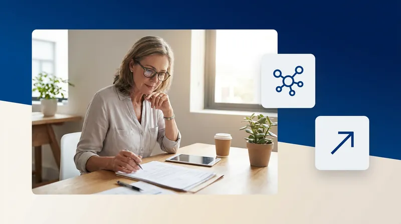 Healthcare administrator reviewing referral documents at a desk, with network and arrow icons