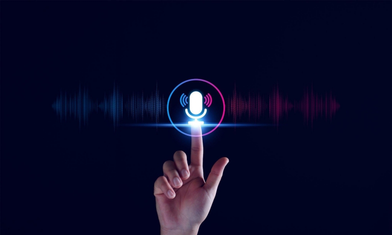 A glowing microphone icon activated by a fingertip, with sound waves on a dark background.