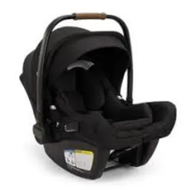 Nuna Pipa Aire infant car seat — lightweight carrier, breathable mesh canopy, sleek black finish.
