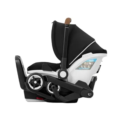 Evenflo Shyft DualRide infant car seat and stroller combo with adjustable canopy and carryall storage