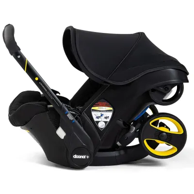 Midnight by Doona infant car seat/stroller combo, compact rear-facing carrier with integrated wheels
