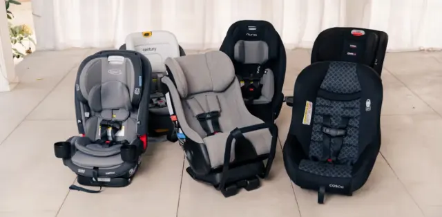 A group of baby seats sitting next to each other