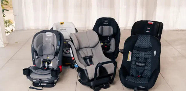 A group of baby seats sitting next to each other
