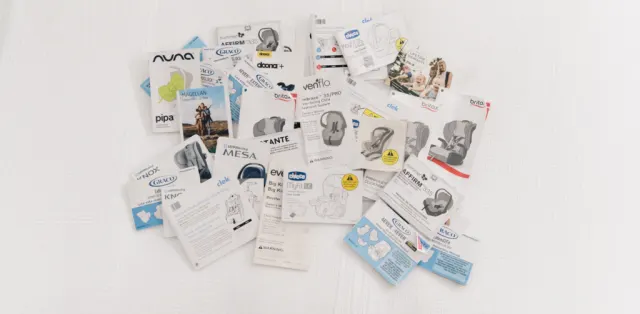 A pile of different types of stickers on a white surface