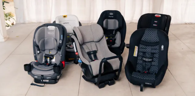 A group of baby seats sitting next to each other