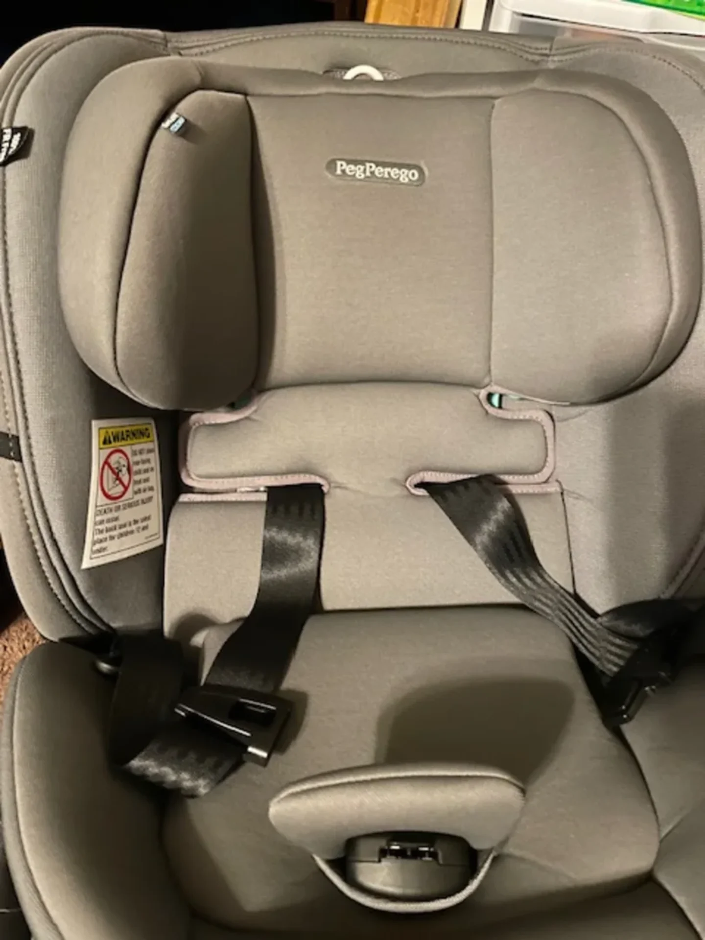 Peg Perego Primo Viaggio All-in-One convertible car seat in gray with 5-point harness and padded headrest