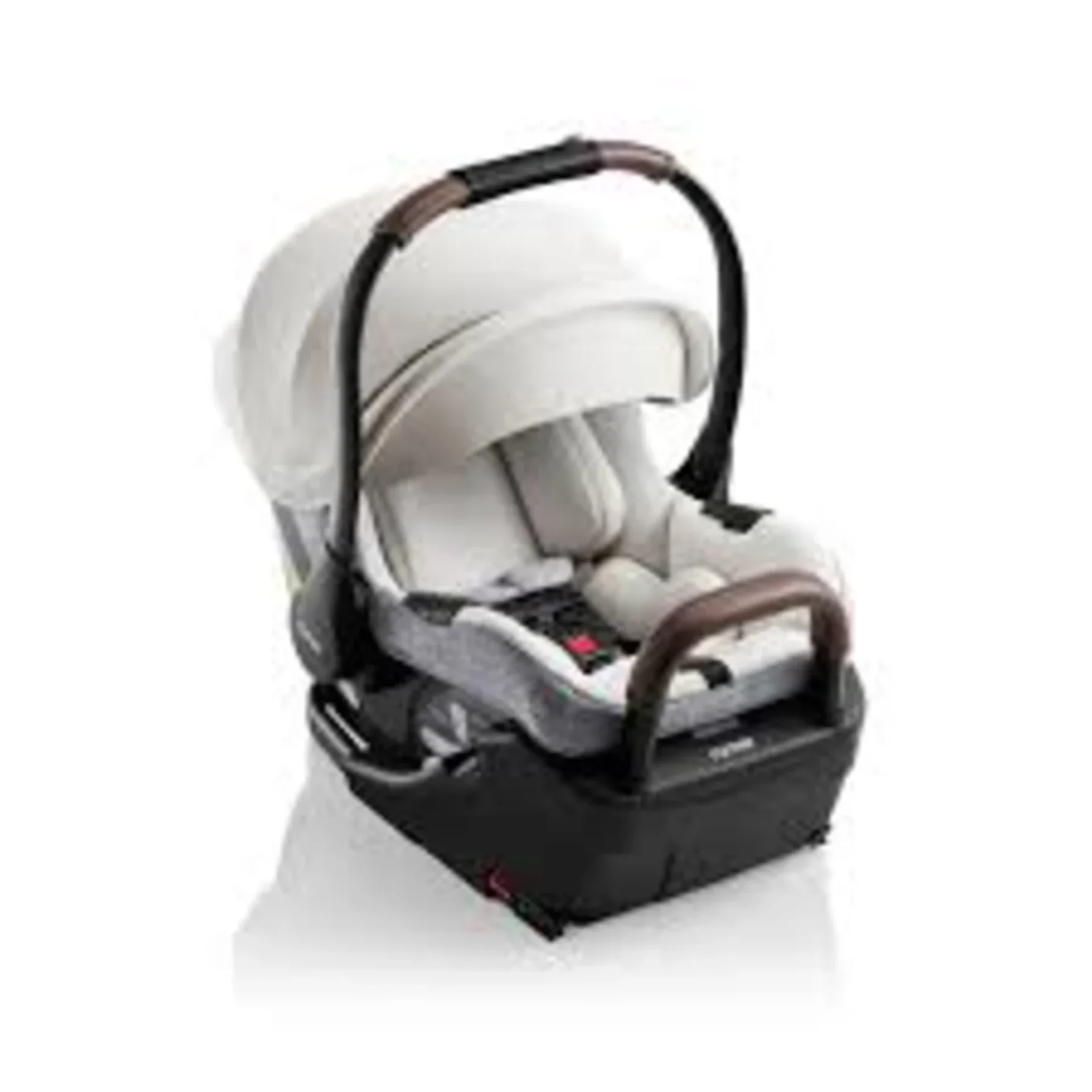 Römer Juni infant car seat in white with black base, brown handle accents, padded canopy and newborn insert, Canada edition