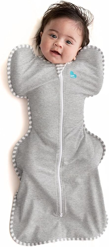 Love to Dream Zip-Up Swaddle Baby wearing a gray Love to Dream zip-up swaddle with arms up