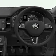 Interior view of a car dashboard featuring a black steering wheel with a central emblem, an instrument cluster with speedometer, and part of the infotainment screen and air vents on the left side.