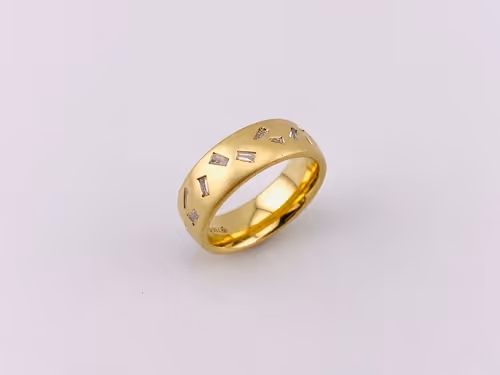750/ooo Gelbgold Ring mit Diamant Trapetzen und Baguettes