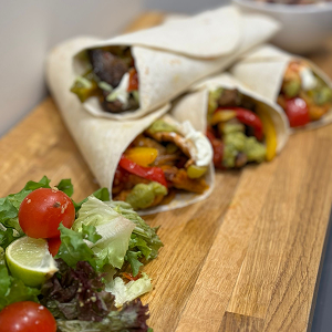 Loaded tortilla wraps with garden salad at Blackbrook Barns, Lichfield, Staffordshire
