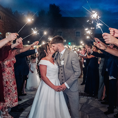 Sparkler send-off kiss at Blackbrook Barns, Lichfield, Staffordshire