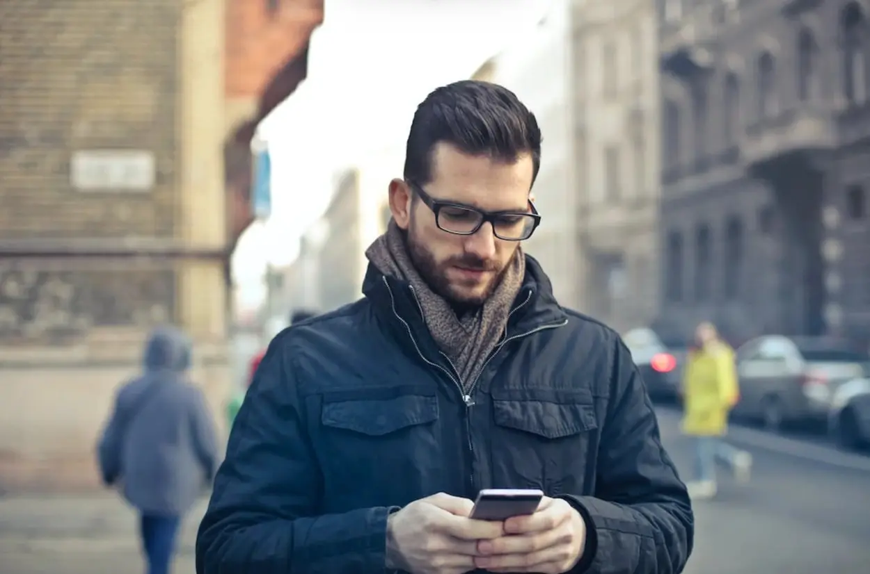 a person looking at his phone
