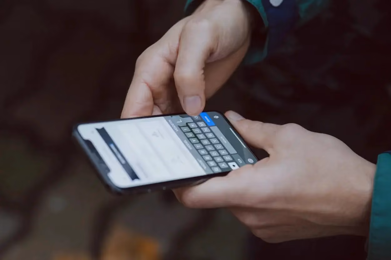 a person holding a cell phone