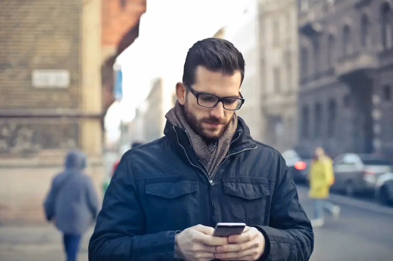a person looking at his phone