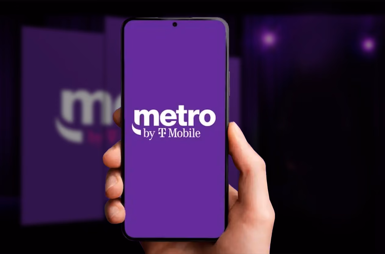 Hand holding a smartphonewith metro mobile logo on the screen