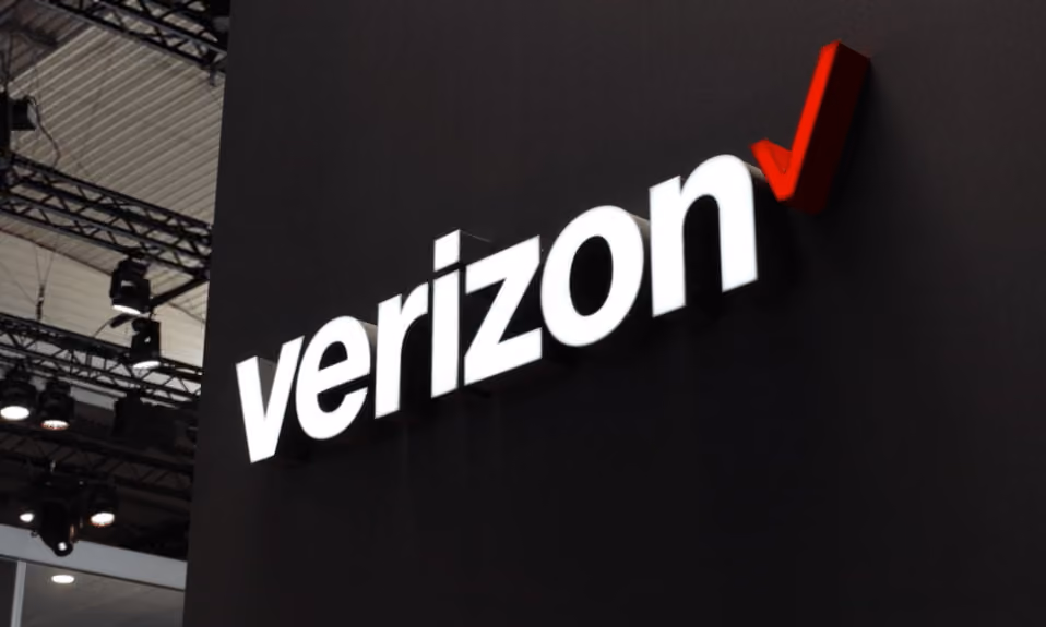 Big Verizon logo on the black wall