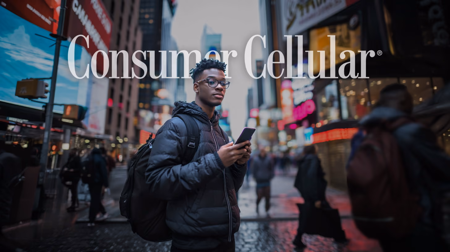 Man holding phone in midtown