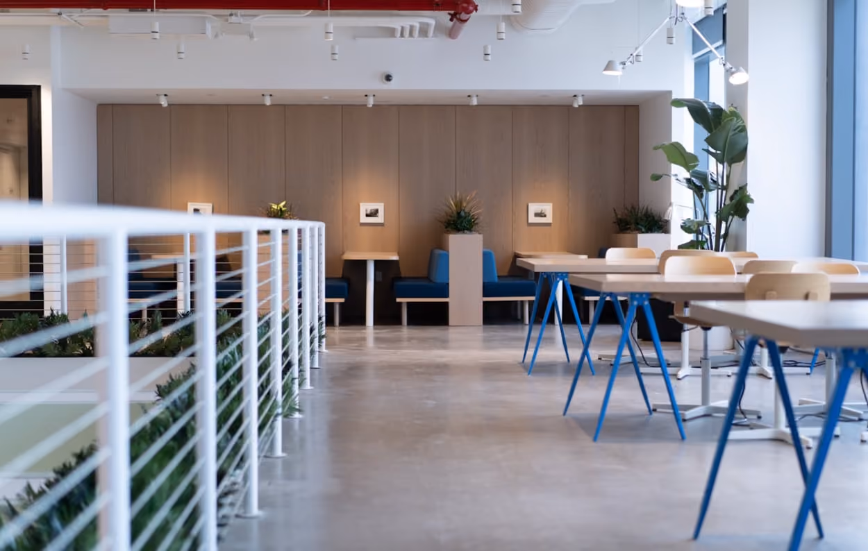 white-and-blue-tables-facing-white-balustrade