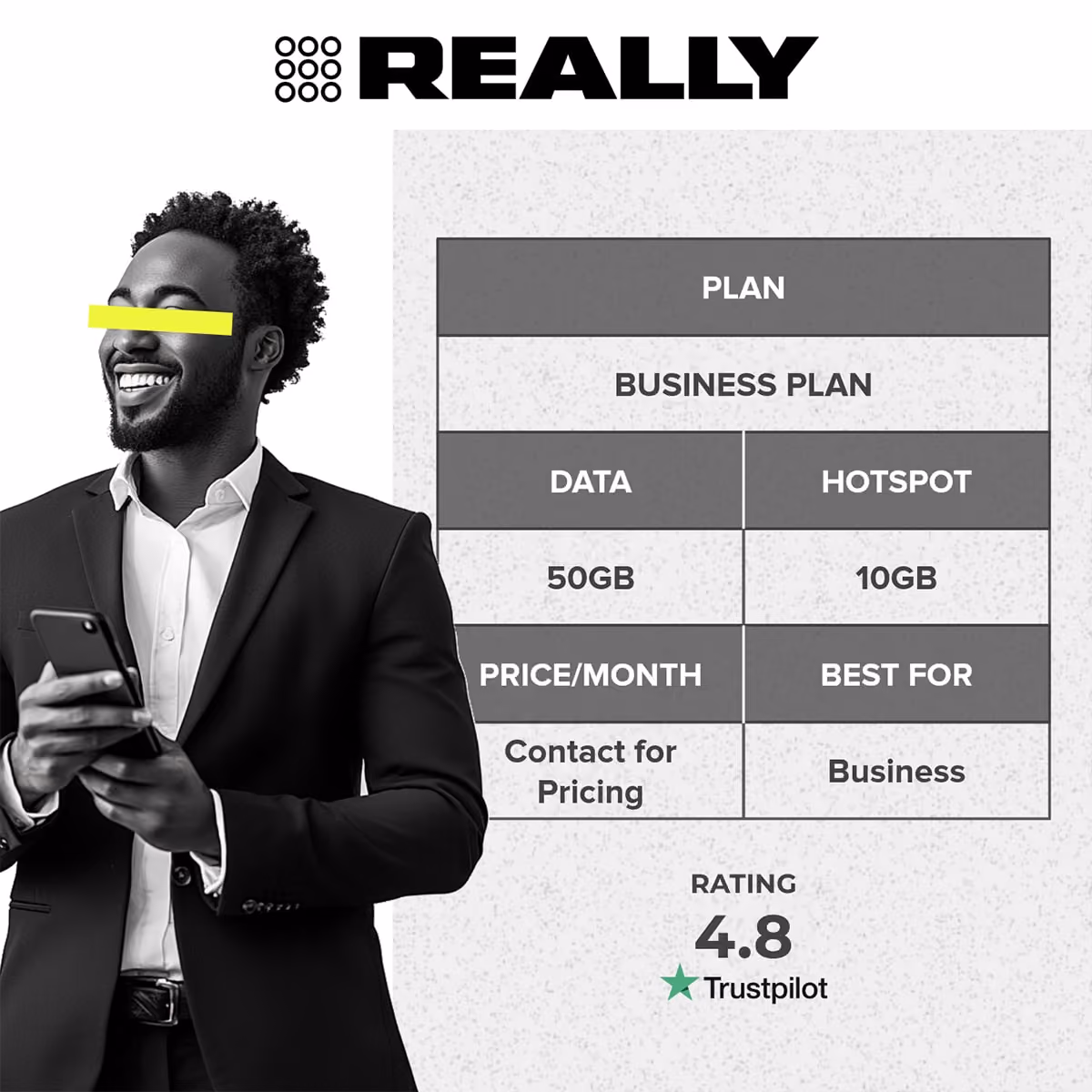 A businessman holding his phone 