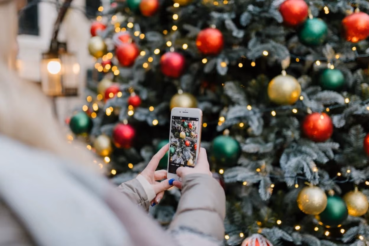 A person take picture of christmas three