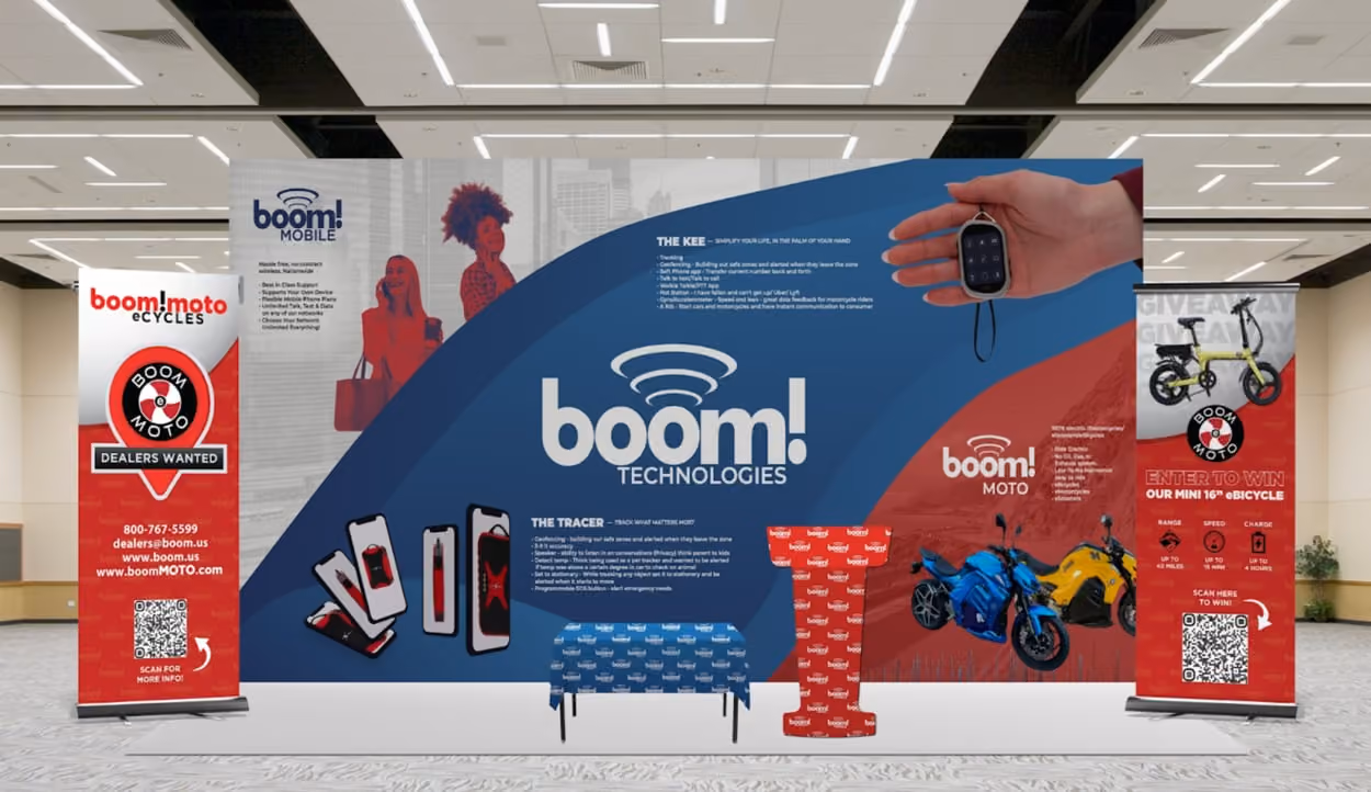 A large Boom! Mobile Show display featuring a vibrant red, white, and blue banner, symbolizing patriotism and celebration.