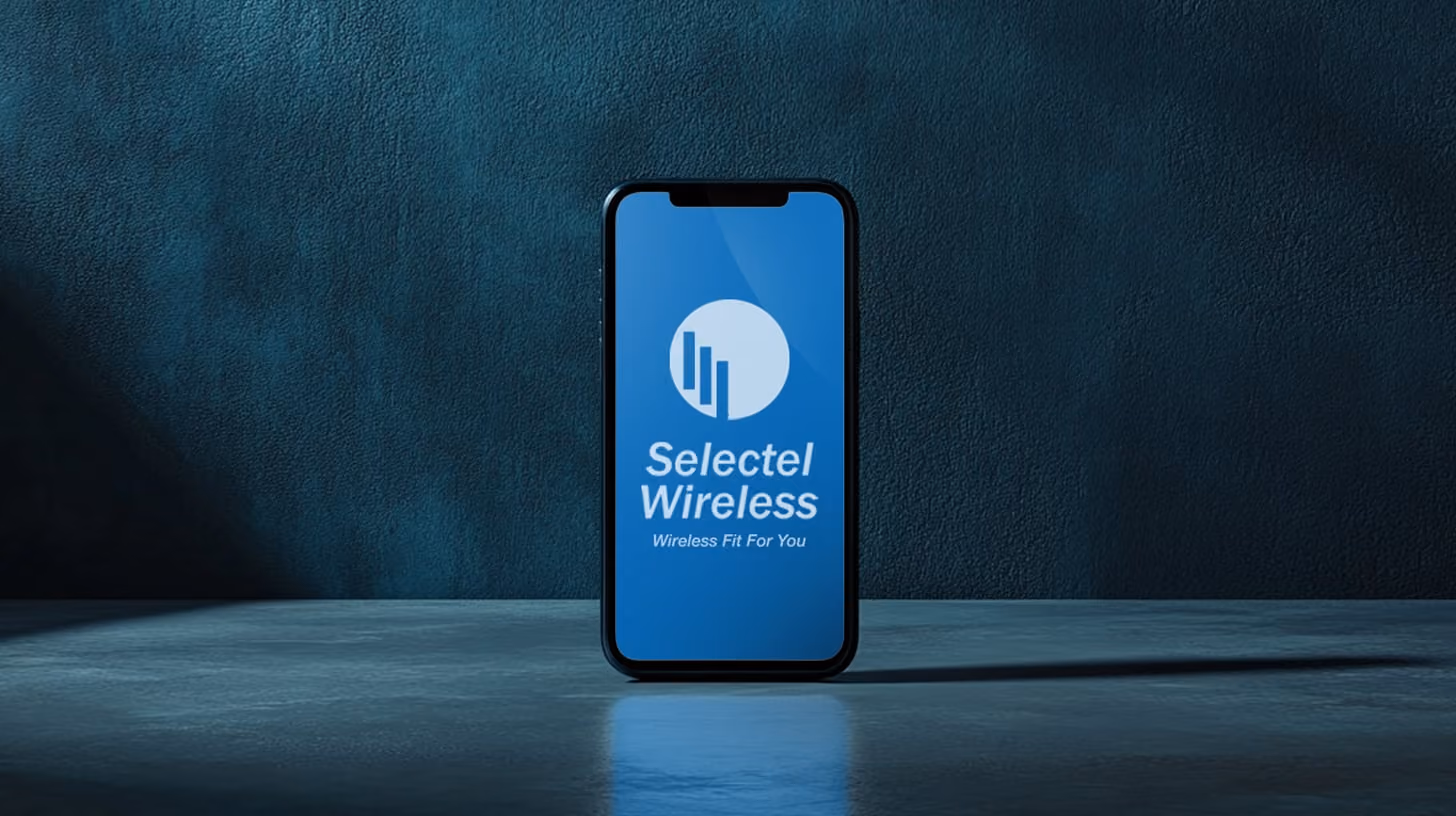 A standing smartphone with Selectel Wireless logo on the screen