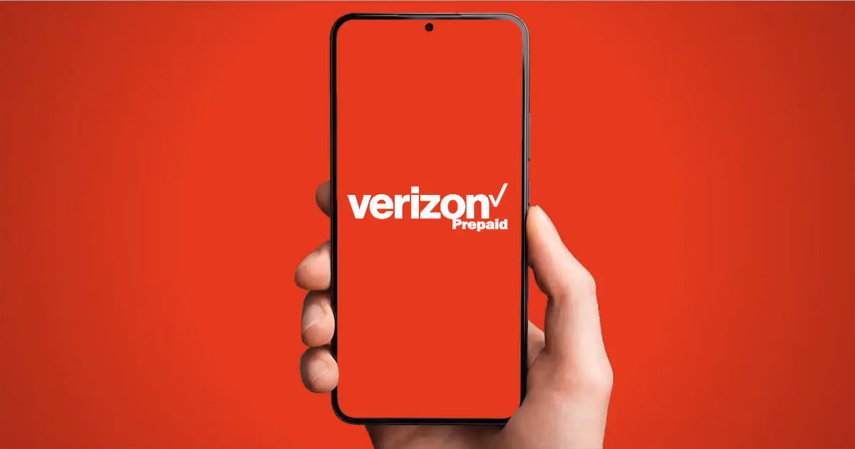 A person holding a smartphone with Verizon Prepaid logo on the screen