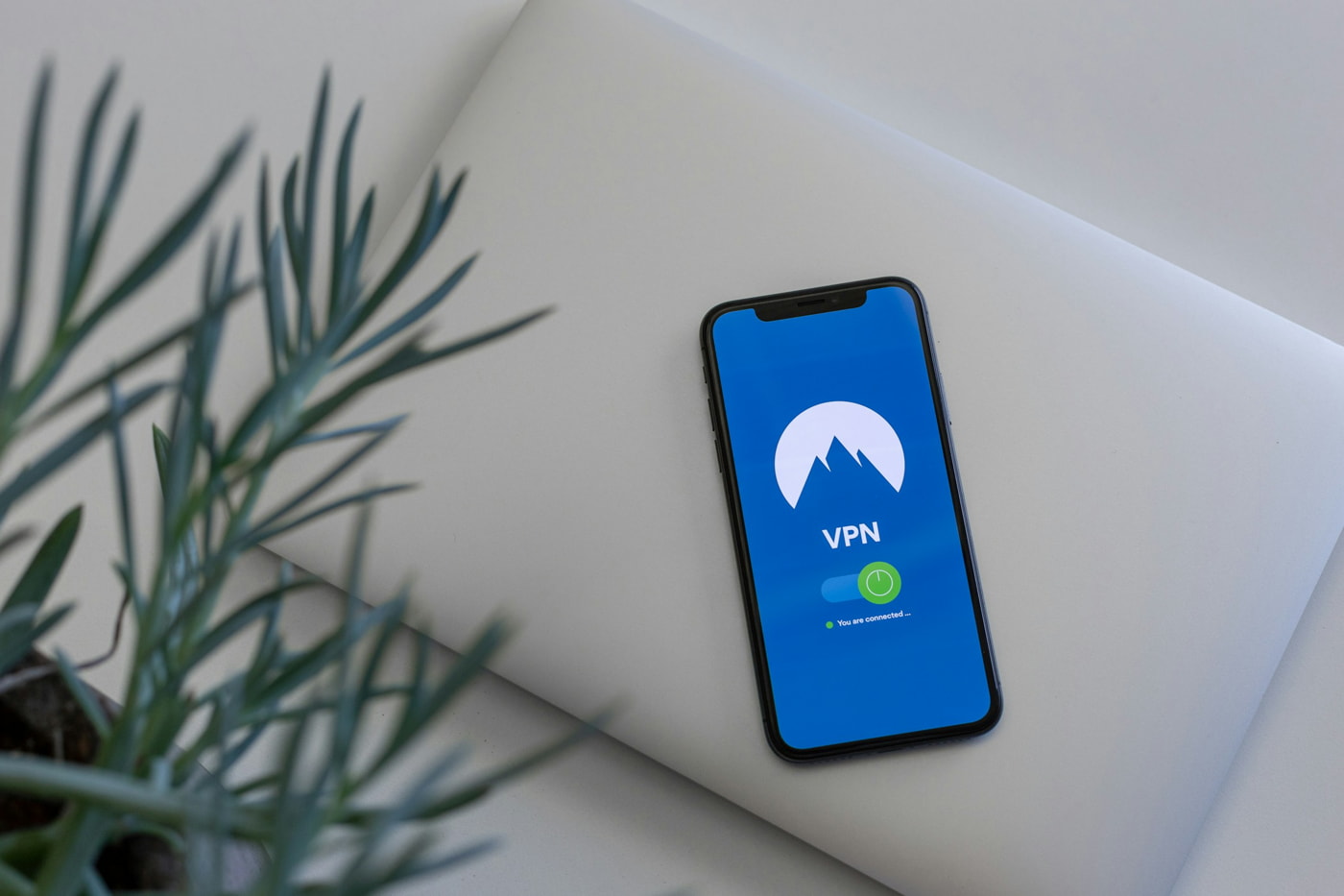 Step-by-step guide on using a VPN on an iPhone, featuring settings and connection instructions.