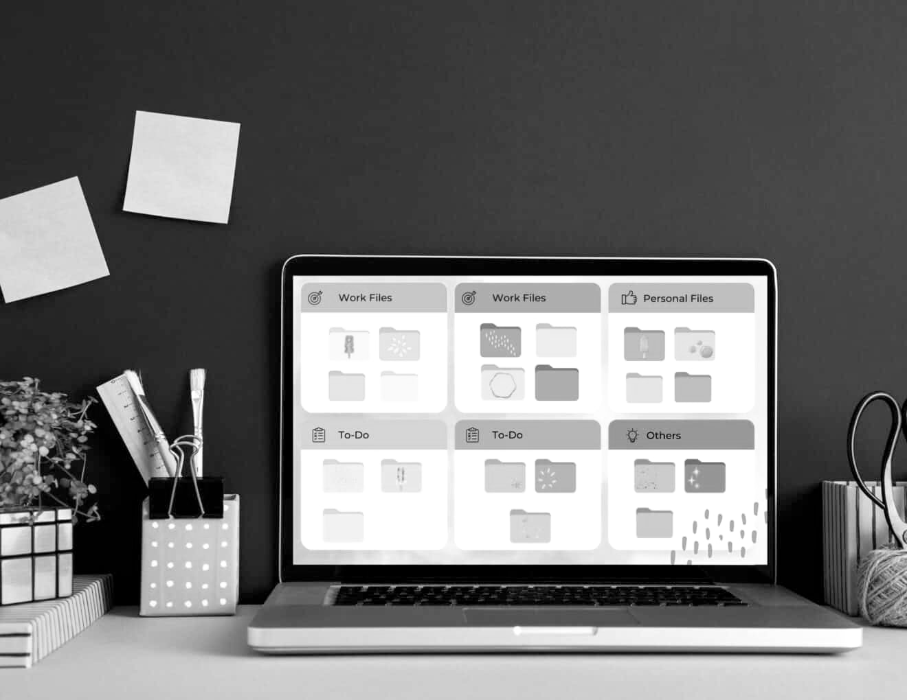 A laptop displaying various sticky notes, showcasing important notes and reminders for organization.