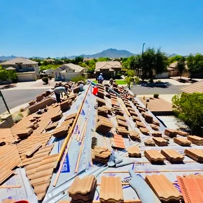Tile roof underlayment replacement in progress on a Gilbert, Arizona home