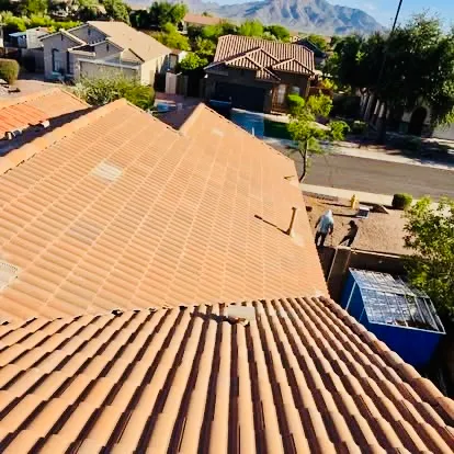 Completed Gilbert tile roof with existing concrete tiles reset over new underlayment