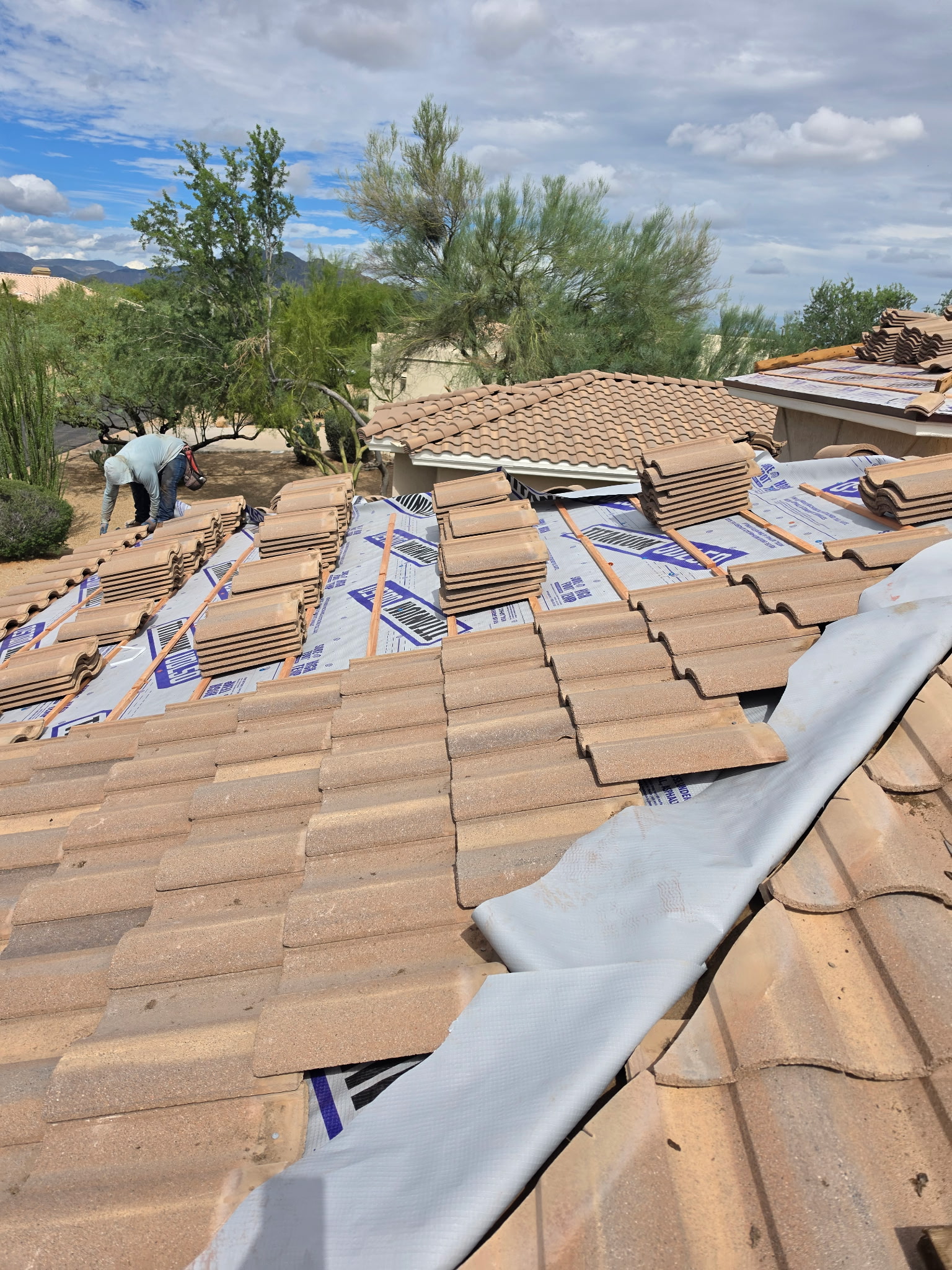 Existing tile staged for the roofing work in Phoenix Arizona