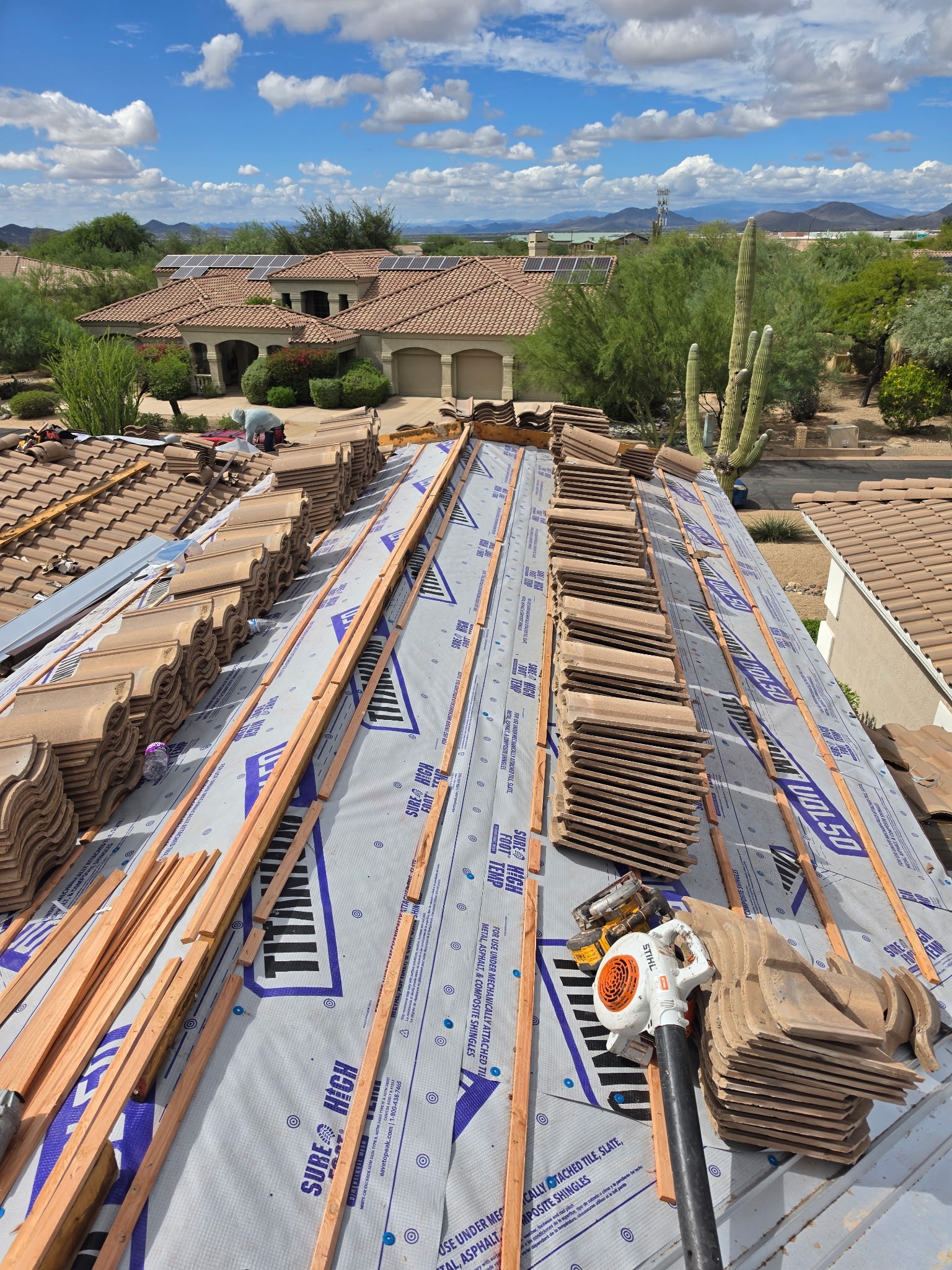 Underlayment and batten installation across the roof plane in Phoenix Arizona