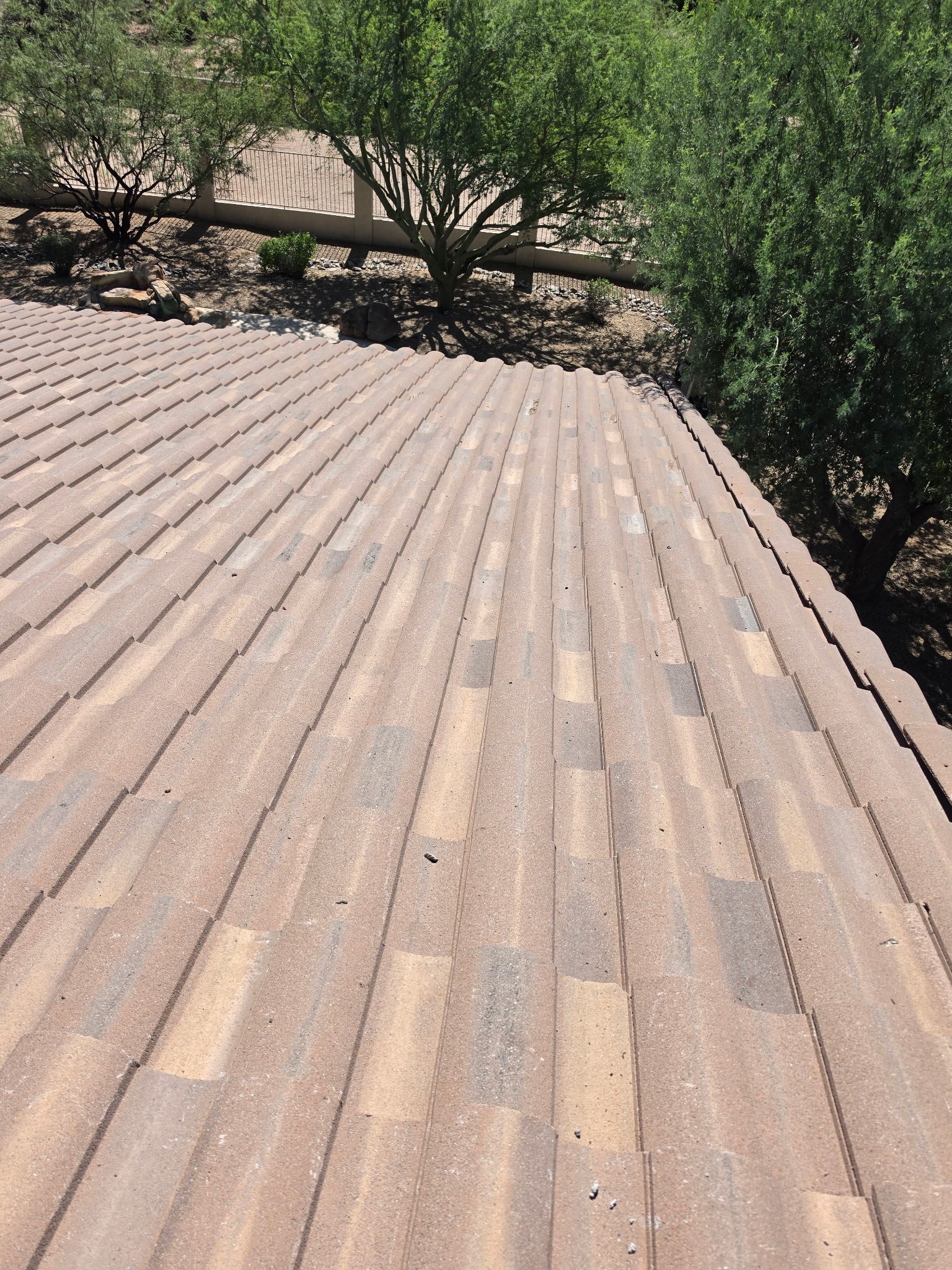 Completed tile roof surface and drainage path in Phoenix Arizona