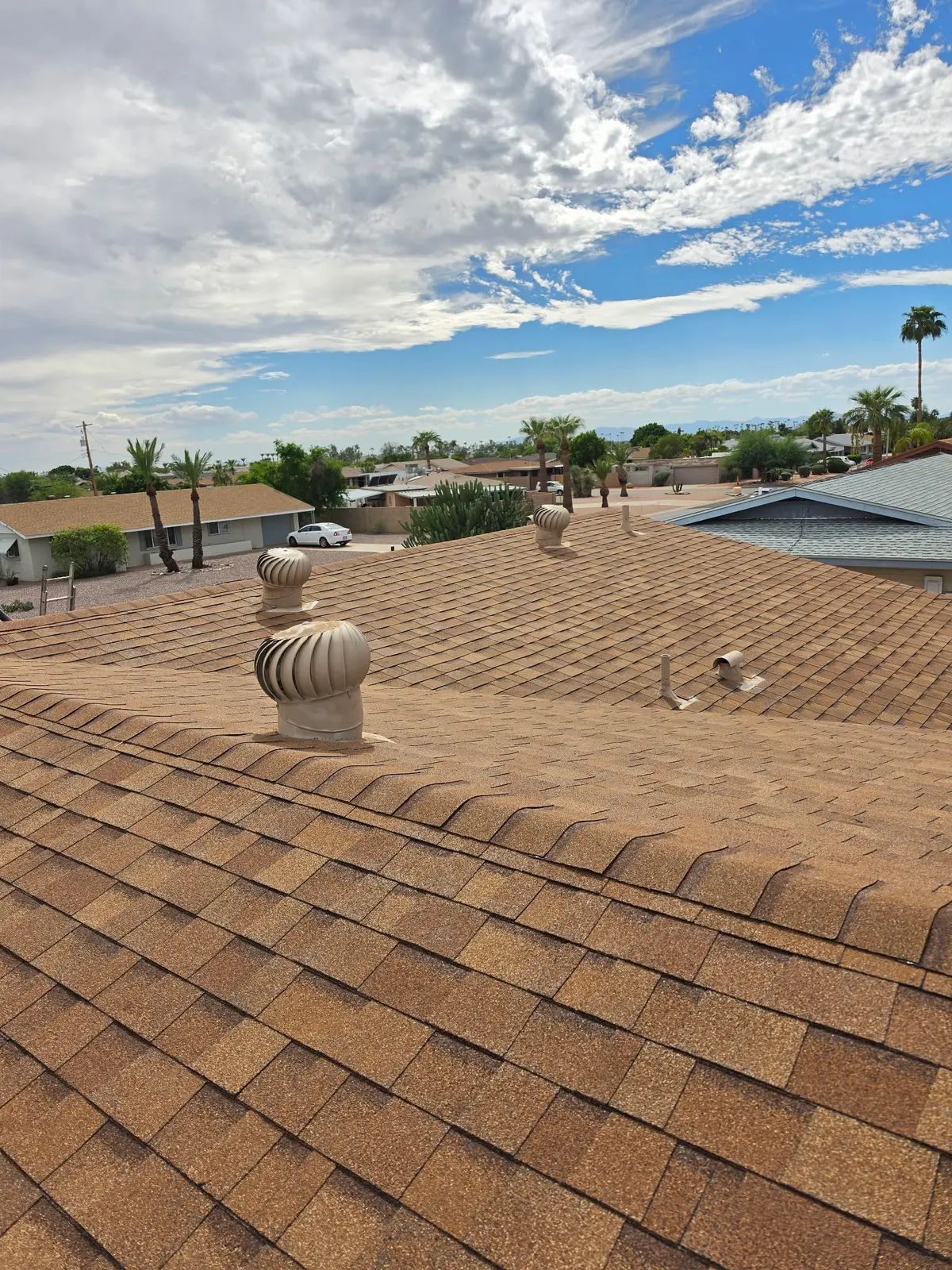 Completed architectural shingle roof replacement by Clarity Construction Group in Mesa, Arizona