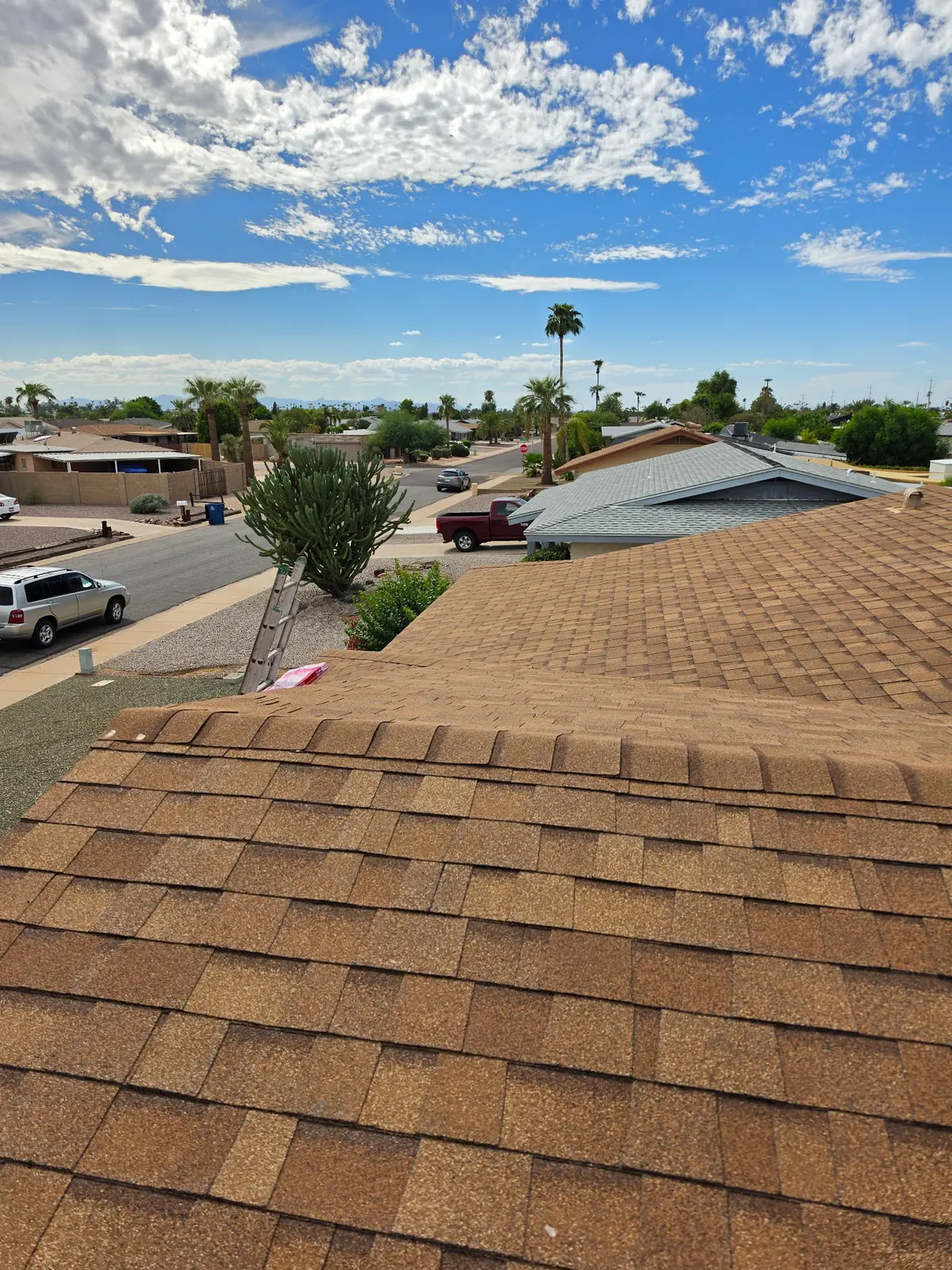 Completed architectural shingles and roof ventilation in Mesa Arizona